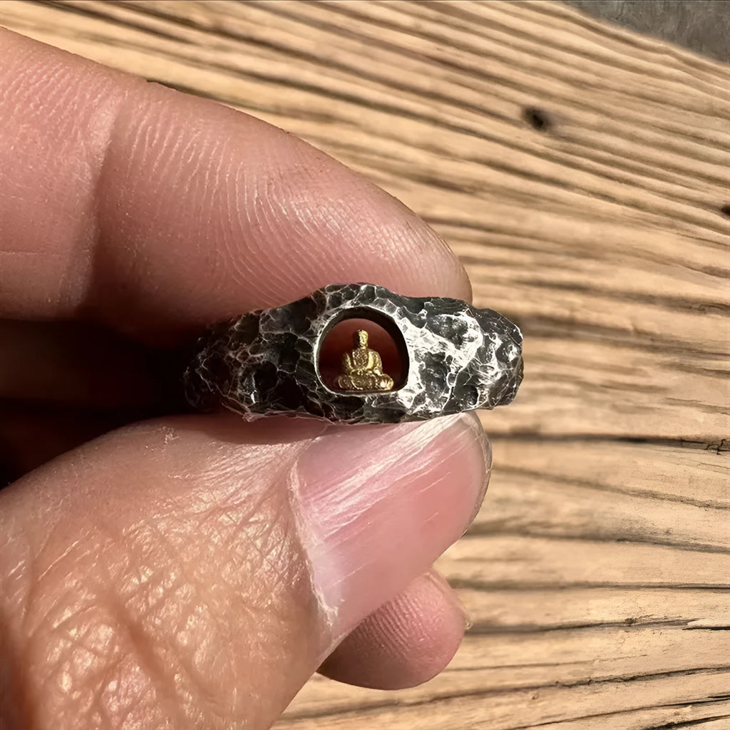 Hand-forged copper grotto Buddha ring with rock texture finish shown in size 8