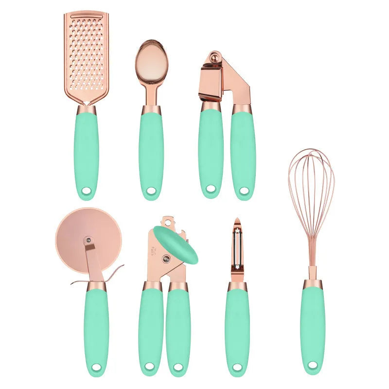 7-piece stainless steel kitchen tool set with copper plating peeler gadget in a cutlery rack on a countertop