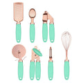 7-piece stainless steel kitchen tool set with copper plating peeler gadget in a cutlery rack on a countertop