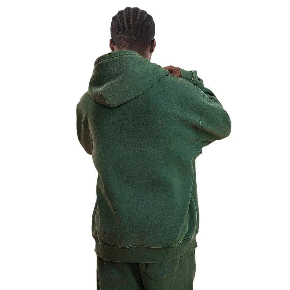 Men's zip-up hooded cardigan in cotton with fleece lining, shown in dark green