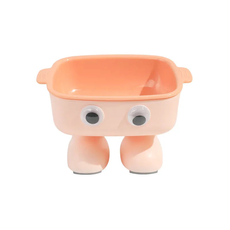 Green robot-shaped tilted cat bowl with detachable inner dish on a non-slip base.