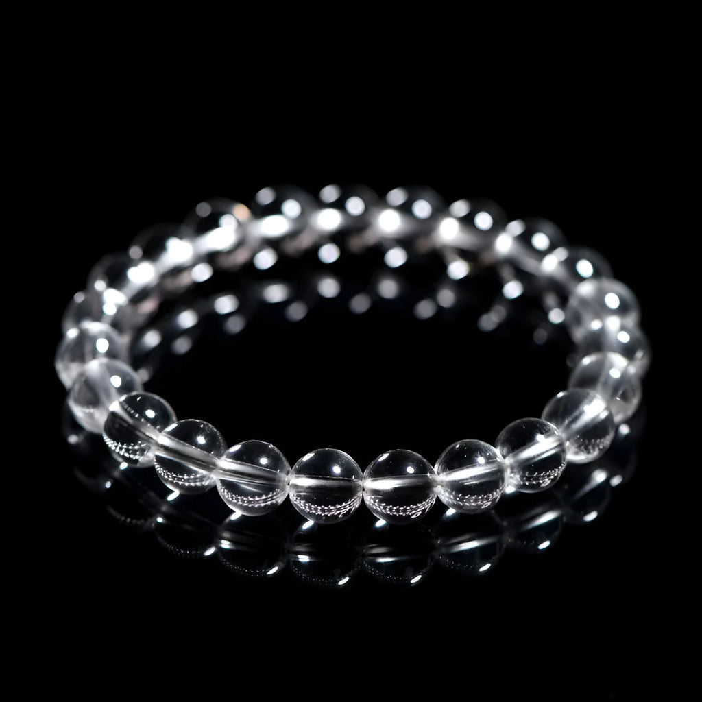 Natural Donghai old materials white water round crystal bracelet with geometric design on wrist.