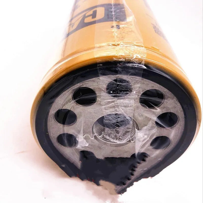 Yellow Caterpillar 324D engine fuel water separator filter element, 262mm tall.