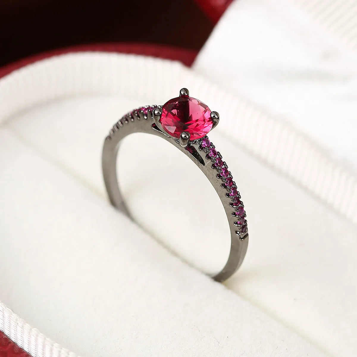 Hexagonal geometric zircon ring in copper with electroplated finish showing angular design and zircon stone