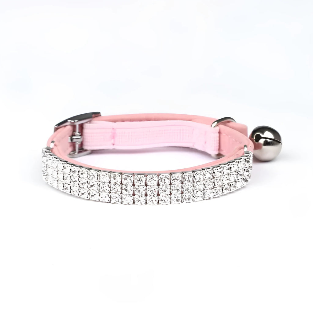 A velvet cat collar with rhinestone decoration, shown in one of five colour options.