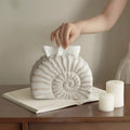 Conch coloured resin tissue box with modern minimalist design for home decor