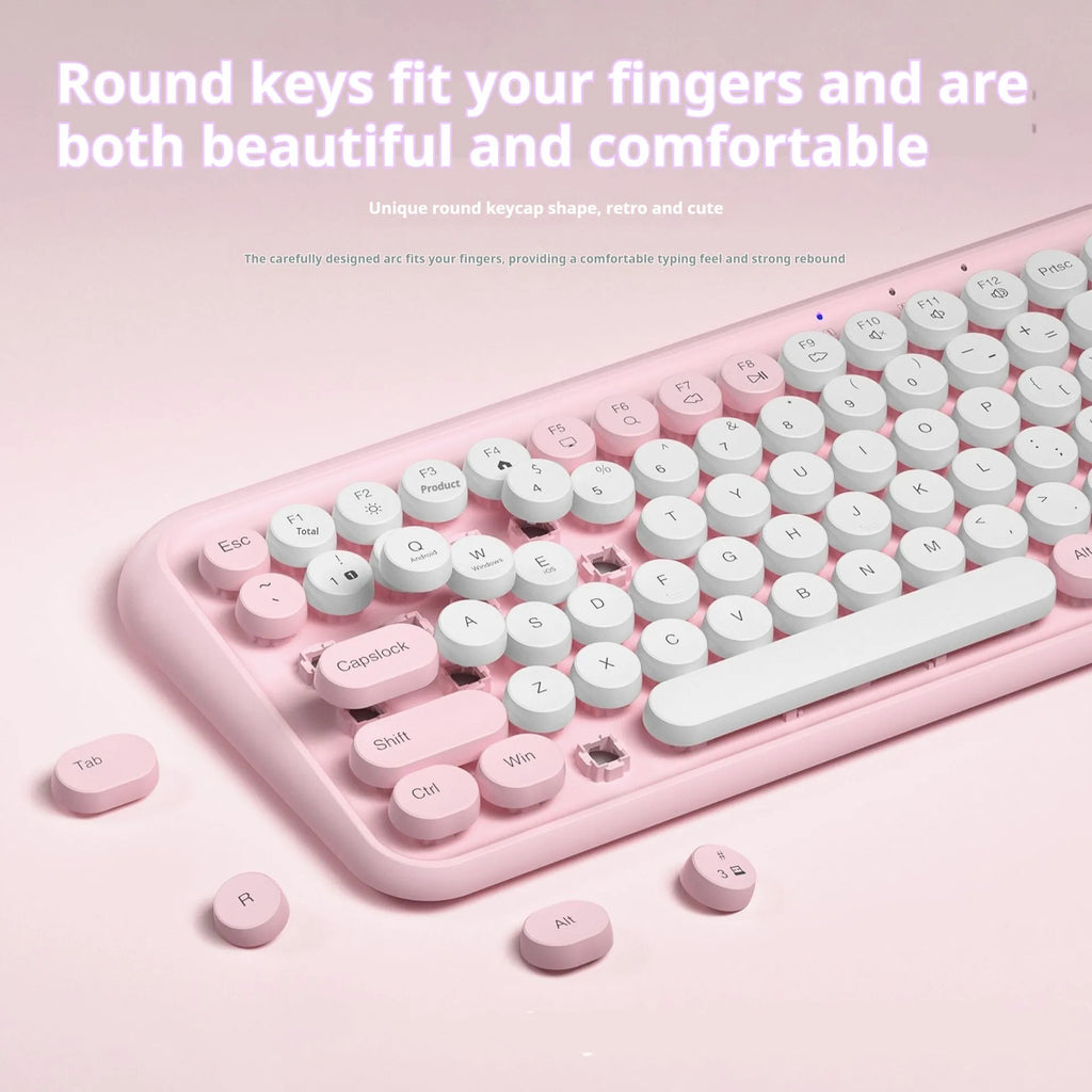 Pink dual-mode wireless Bluetooth keyboard with 84 keys and portable design