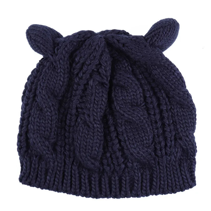Hand knitted wool cat ear beanie in red colour for winter wear