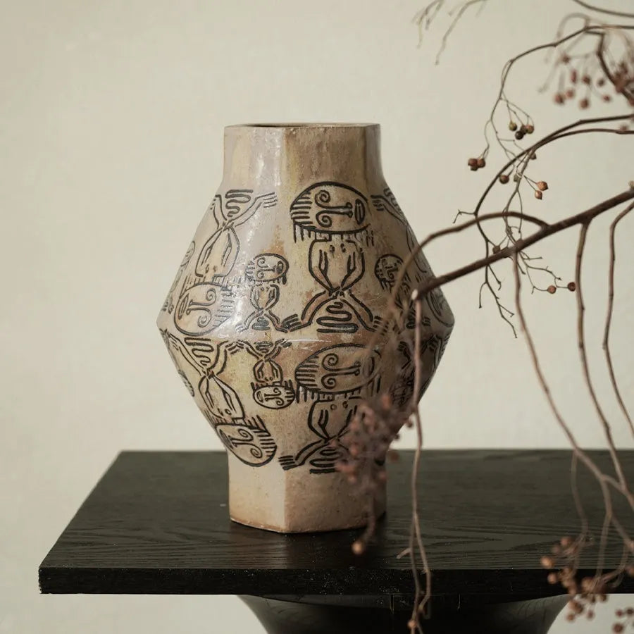 Hand-painted ceramic cylindrical table vase with carved vintage art and religious patterns