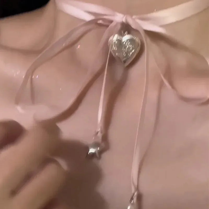 Women's ribbon love pendant fashion necklace on clavicle-length alloy chain with electroplated finish