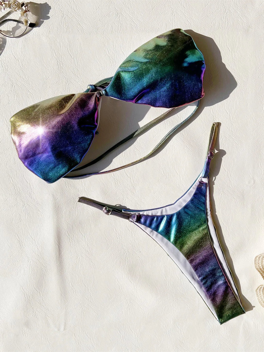 Women's purple gradient bikini swimsuit set on a mannequin, showing the colour transition.