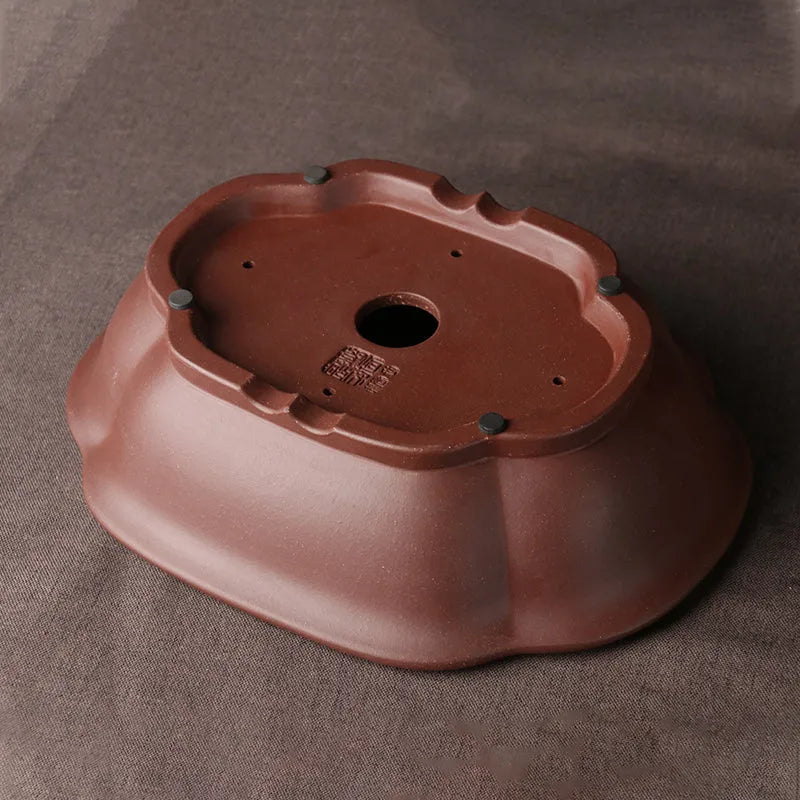 Handmade purple clay bonsai basin in plain Chinese style, shallow rectangular shape.