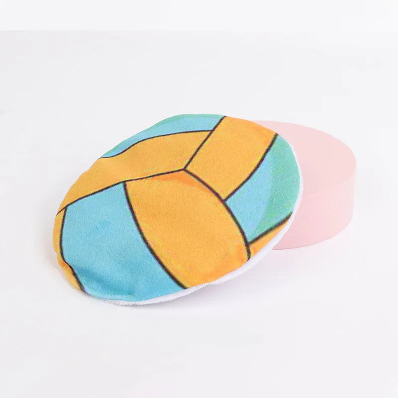 Plush cat flying disc toy with sports ball pattern, containing catnip and crinkle sound.