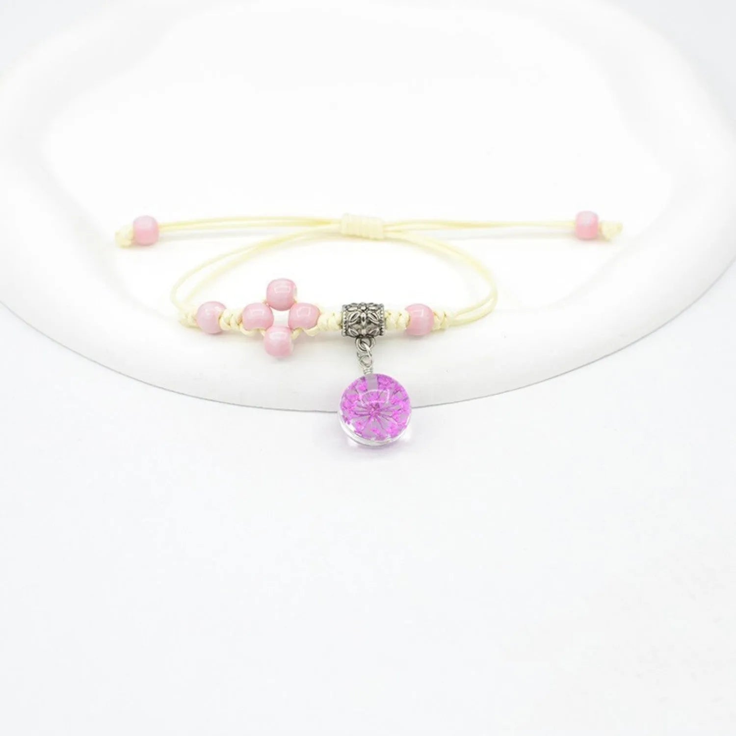 Glass bracelet with dried flowers inside 1.4cm beads on lace-style band in multiple colour options