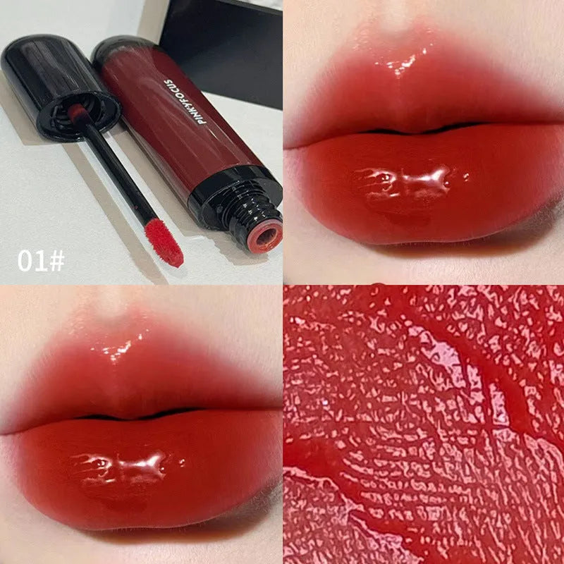 Black Citrus Mirror Lip Lacquer tube showcasing six colour shades: Black Tomato, Orange Brown, Bean Paste, Rose, And Red, Sweet Potato.