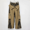 Women's high waist straight leg jeans with leopard print and fake two-stitching tooling details