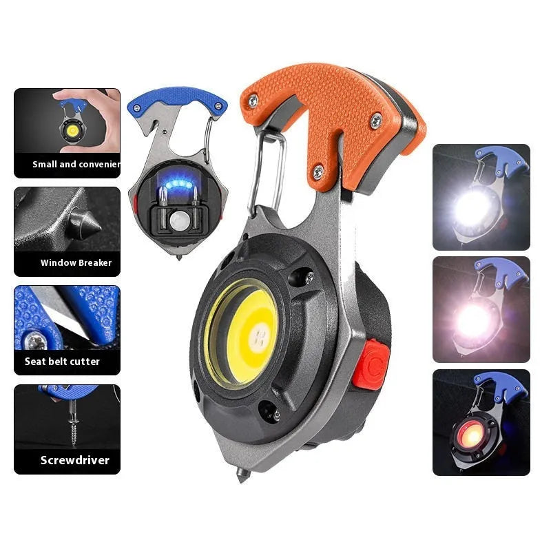 Compact silver and black keychain flashlight with multiple LEDs, a keyring loop, and a pointed window-breaking tip.