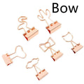 Gold-plated long tail hair clip showing decorative motifs including flamingo, love, clouds, cat, cactus, and bow designs