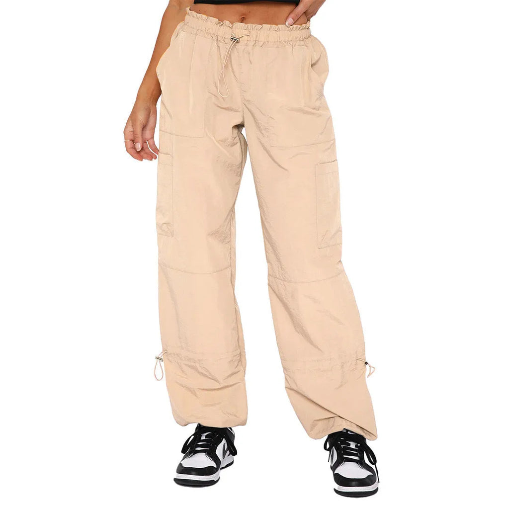 Straight leg multi-pocket cargo trousers in polyester fabric, shown in a neutral colour with visible cargo pockets.