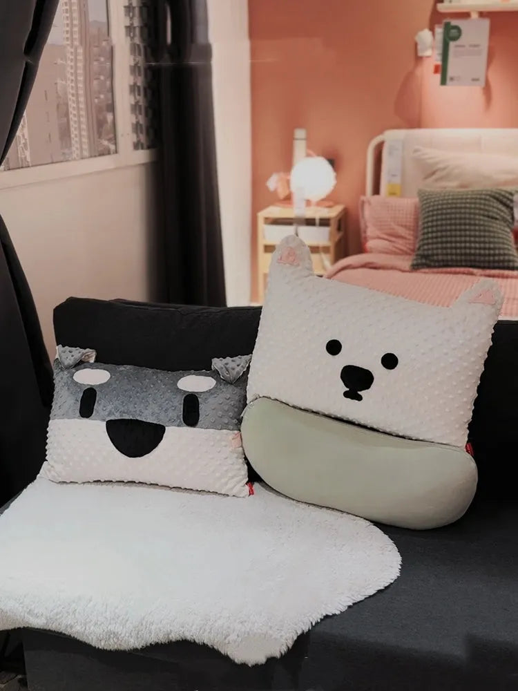 Grey Schnauzer design dog cushion pillow on a sofa, measuring 50cm long