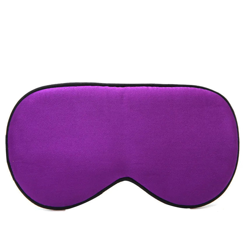 Double-sided mulberry silk eye mask in champagne colour with embroidered print.