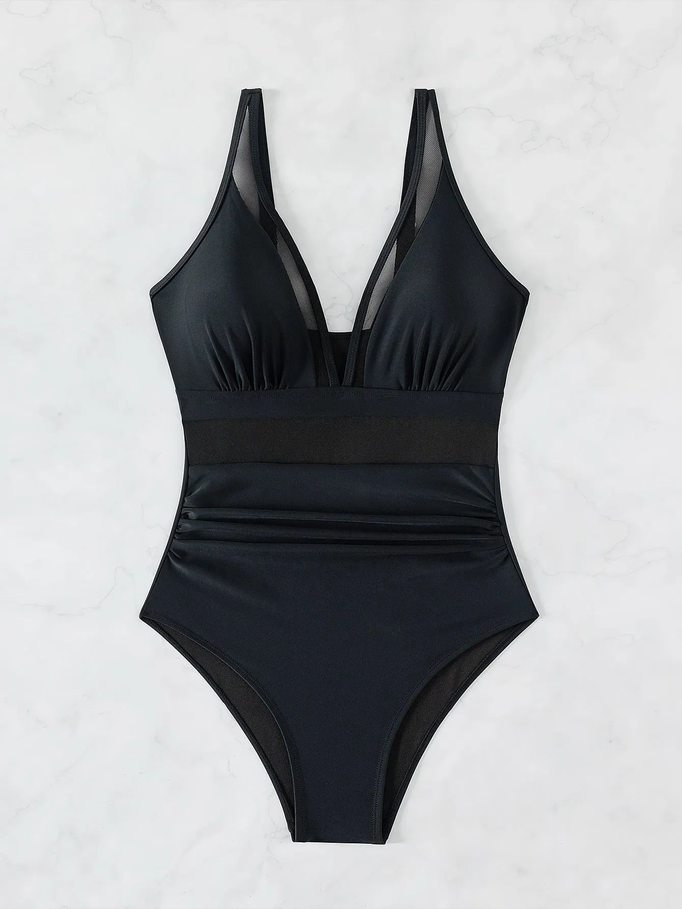 Black women's halter one-piece swimsuit with briefs cut in nylon fabric