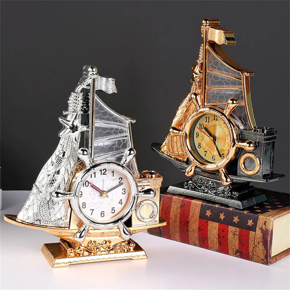 Gold or silver fashion bedroom alarm clock with plastic construction on wooden desk