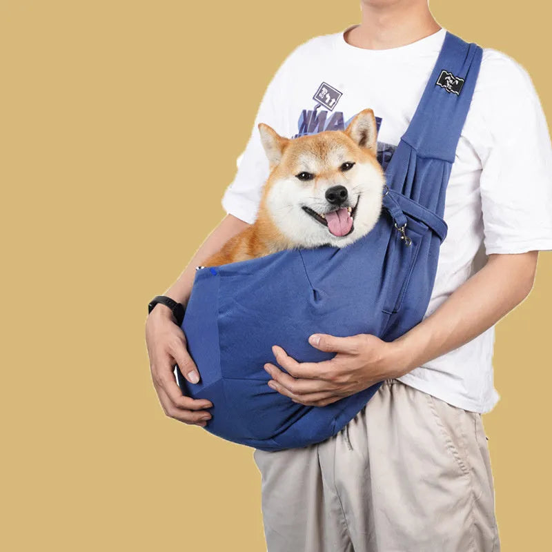 Large breathable mesh cat carrier backpack shown in a folded position and worn on a person's back.