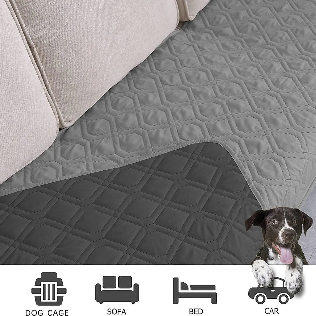 Reversible dog blanket couch cover in grey, laid flat on a sofa