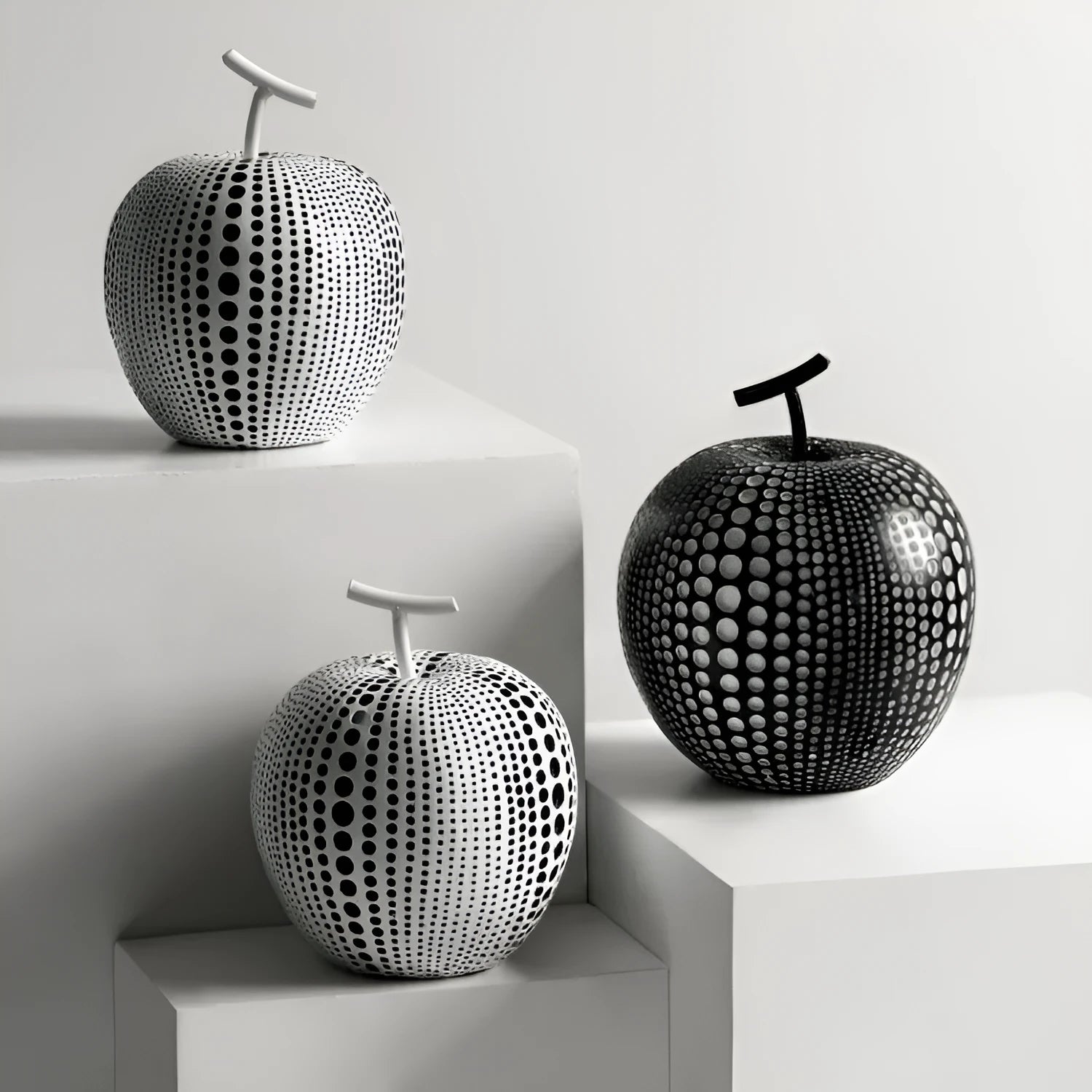Resin apple and pear decorative crafts in black, white, orange, and blue colours