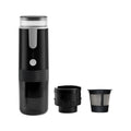 Black portable wireless coffee machine for K-Cup pods, shown next to a car cup holder