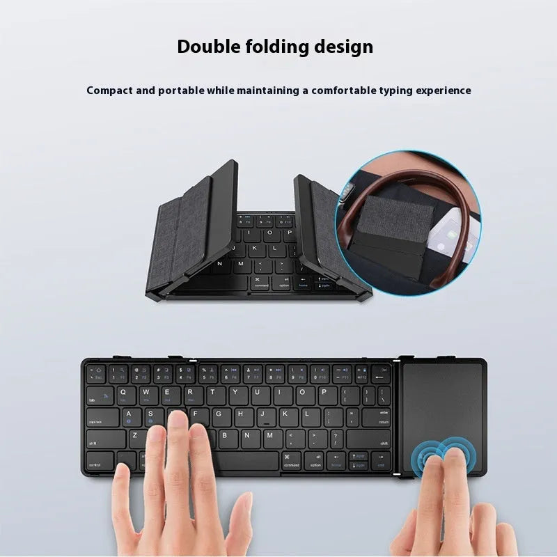 Black folding Bluetooth keyboard unfolded showing full keyboard layout with optional touchpad accessory