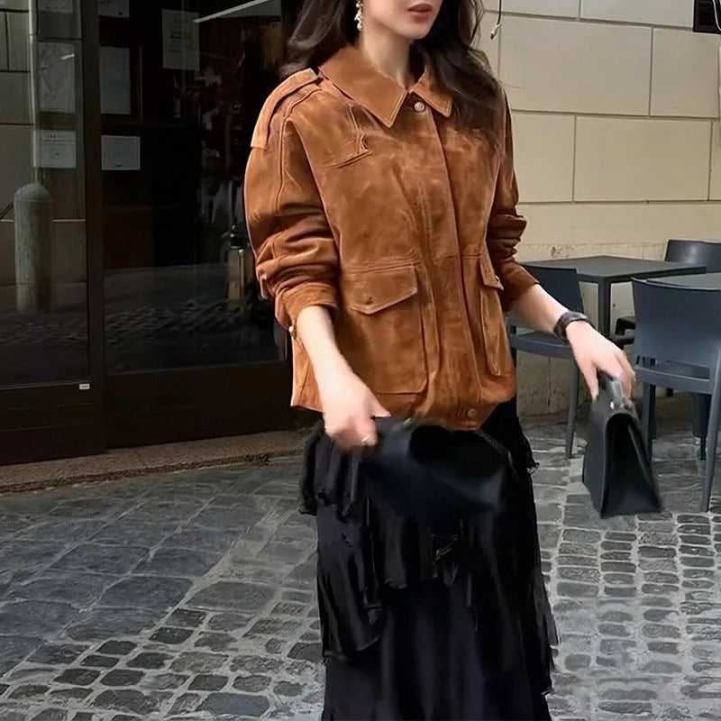 Women's brown polyester suede coat with regular sleeves on a hanger.