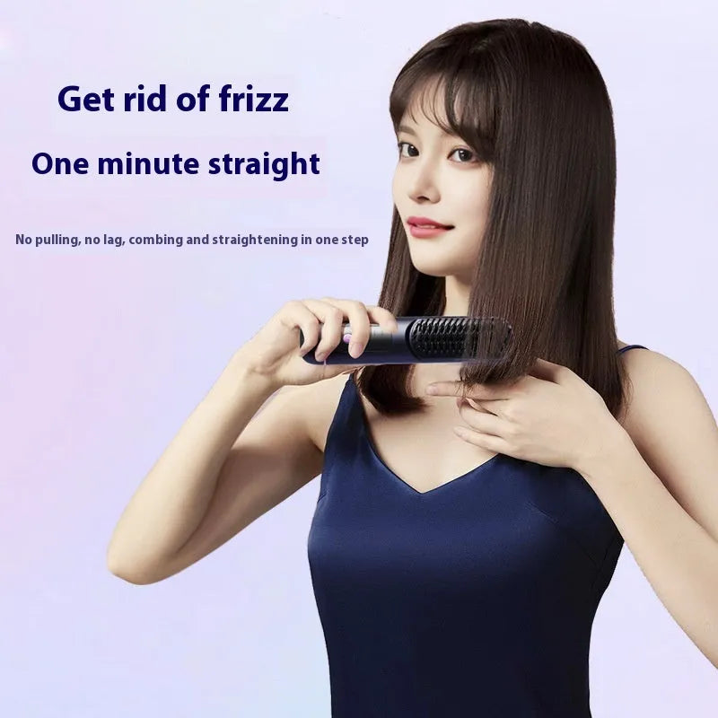 White portable negative ion hair comb with rechargeable battery on a plain background.