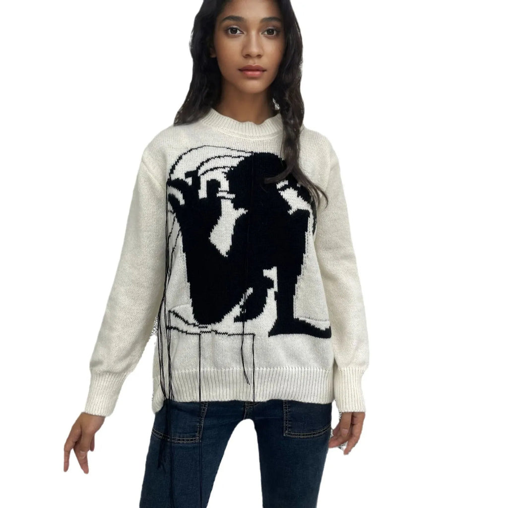 Women's loose Alpaca wool sweater with tassel design and abstract pattern in grey colour