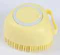 Blue silicone dog bath brush with soft bristles for pet grooming and shampoo application