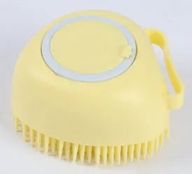 Blue silicone dog bath brush with soft bristles for pet grooming and shampoo application