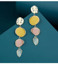 Morandi three-colour oil drip finish on a pair of simple alloy disc earrings with sterling silver posts.