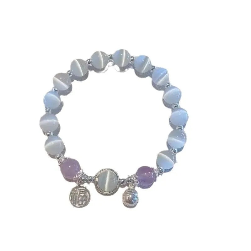 Handmade glass butterfly bracelet in moonlight grey with drop shape design and coloured glass beads