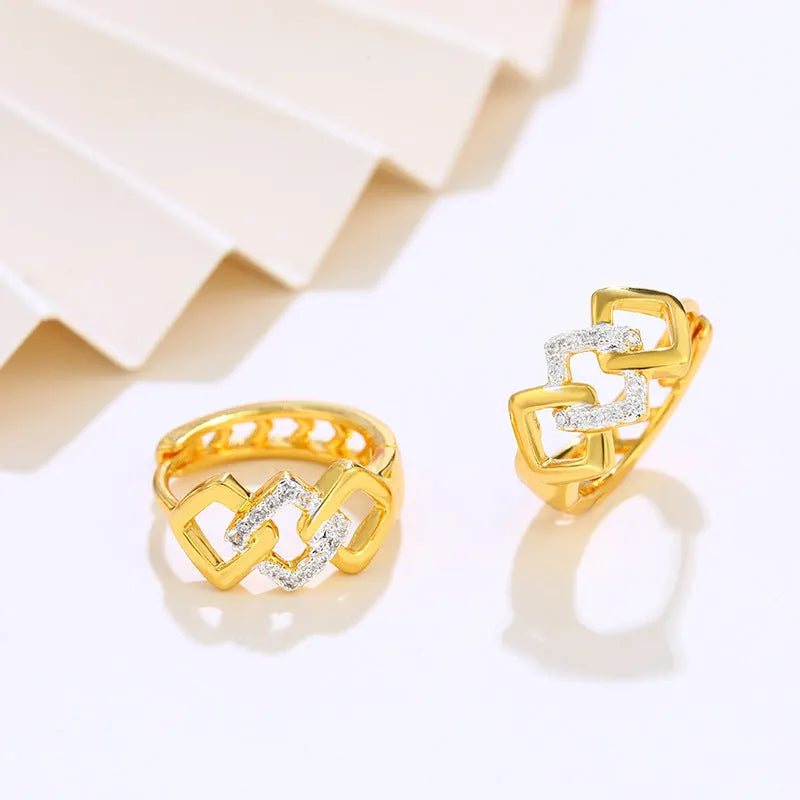 Geometric hollow-out gold ear clip earrings with alloy construction