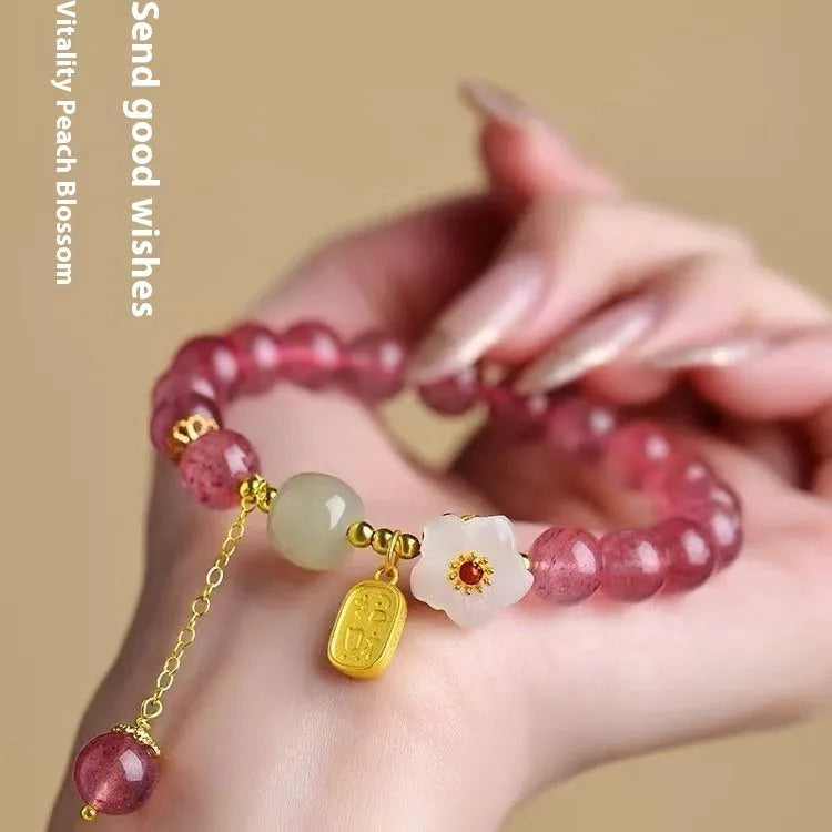 Handcrafted strawberry quartz crystal bracelet with green strawberry quartz moon charm for women