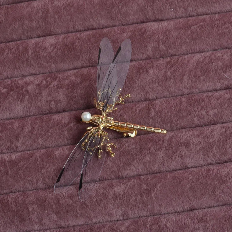 Gold dragonfly side clip headdress with detailed alloy construction and electroplated finish