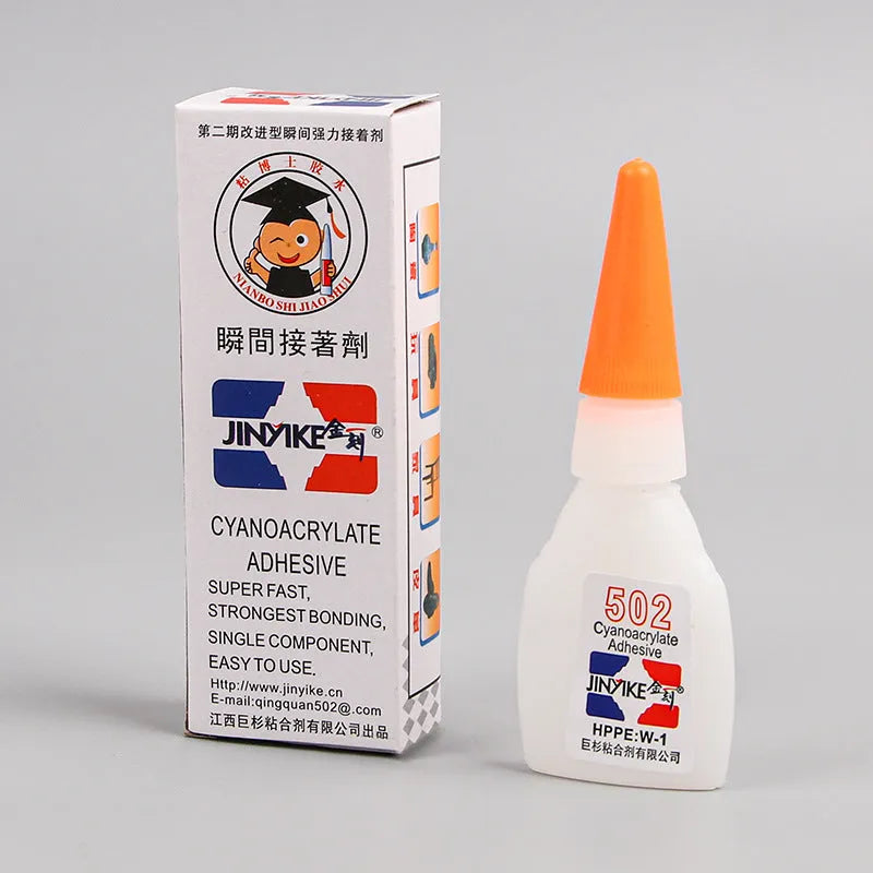Tube of instant strong adhesive glue for specialised shoe sole and heel repairs.
