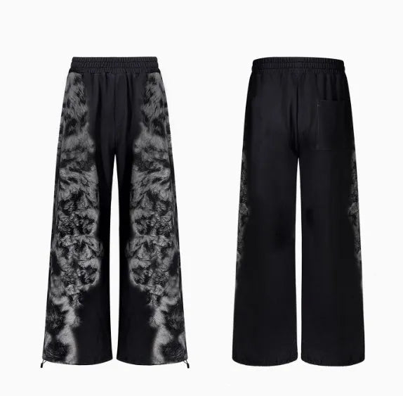 Women's three-piece polyester trousers set with hoodie in loose streetwear style featuring collage stitching