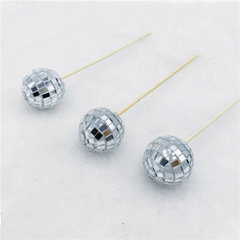 Glass disco ball cake decoration on wooden stick available in four sizes from 2.5cm to 5cm diameter
