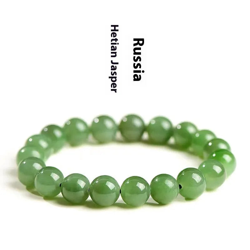 Polished Hetian jade bead bracelet in jasper colours, shown in various bead sizes on a wrist.