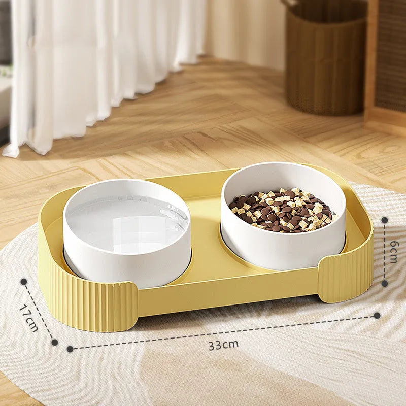 Ceramic elevated cat bowl set with tilted design and anti-spill rim in three colour options