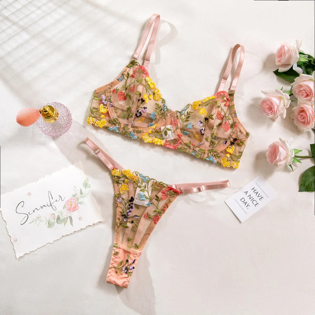 Floral mesh underwear suit with steel ring T-back in skin colour on mannequin