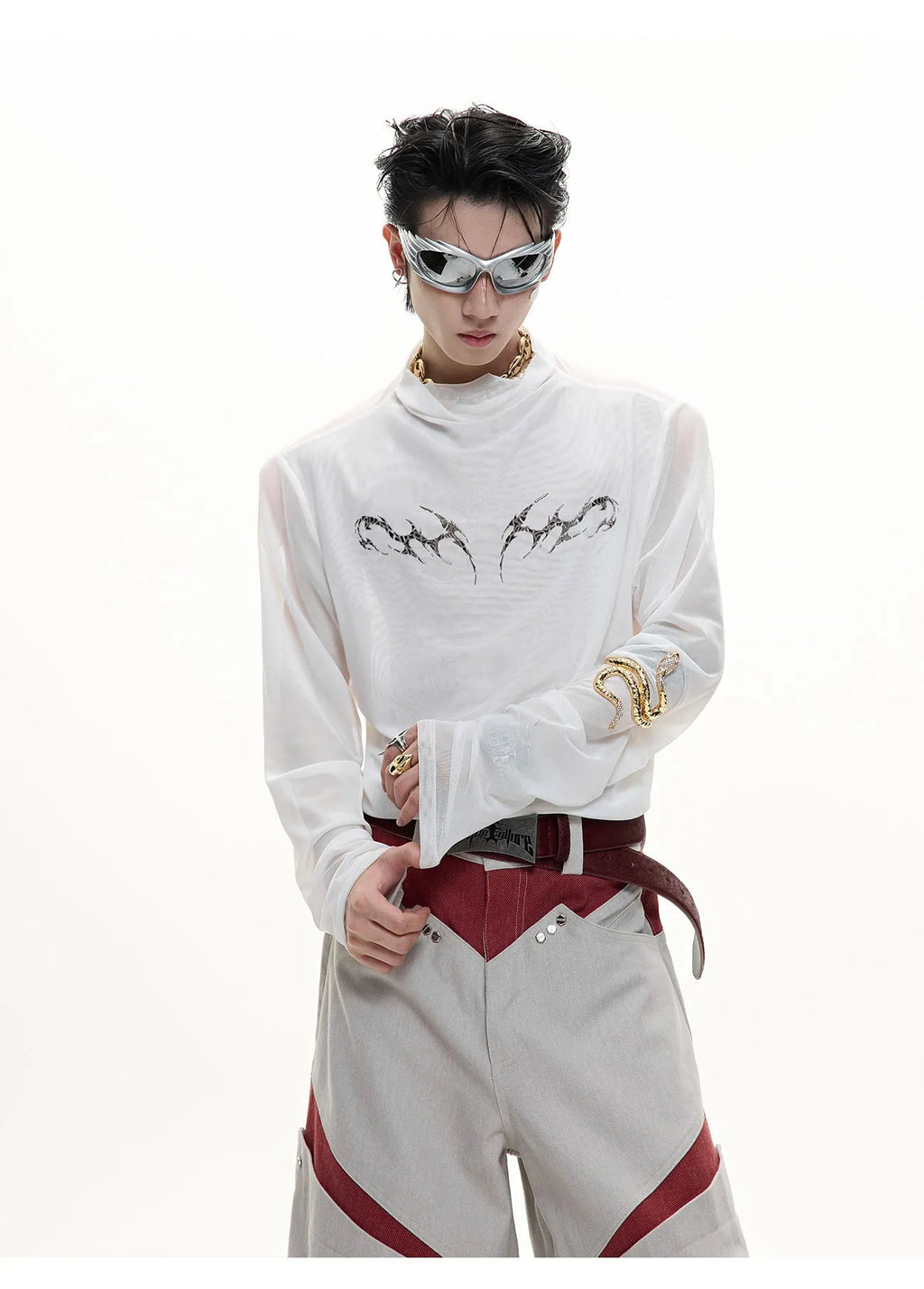 Black mesh slim-fit long sleeve base layer shirt laid flat, showing its texture and cut.