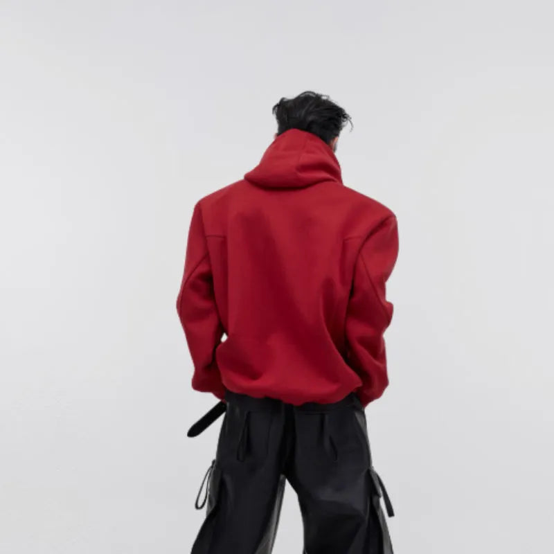 Men's black hooded sweater with metal-effect printing detail and structural shoulder pads